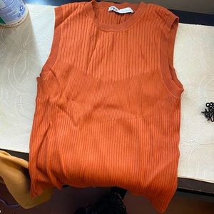 Rust colored no sleeve tank top